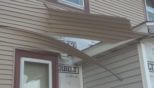 buckled siding