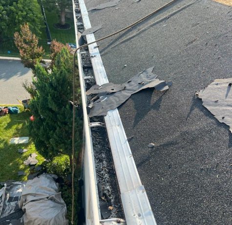 clogged gutters roof damage