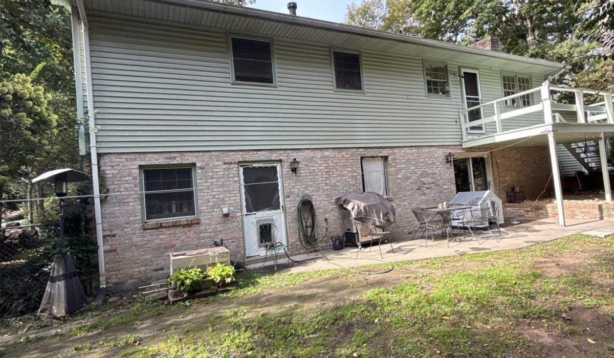 storm damage to roof siding and gutters