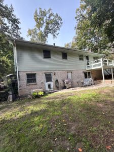 storm damage to roof siding and gutters